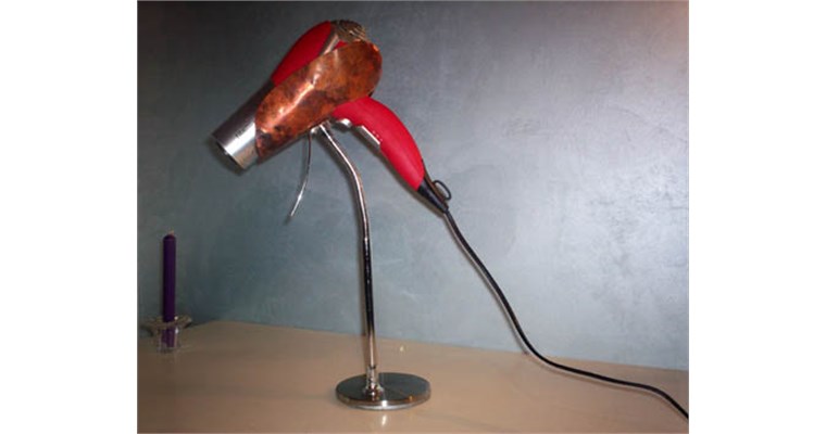 Supporto orientabile per asciuga capelli